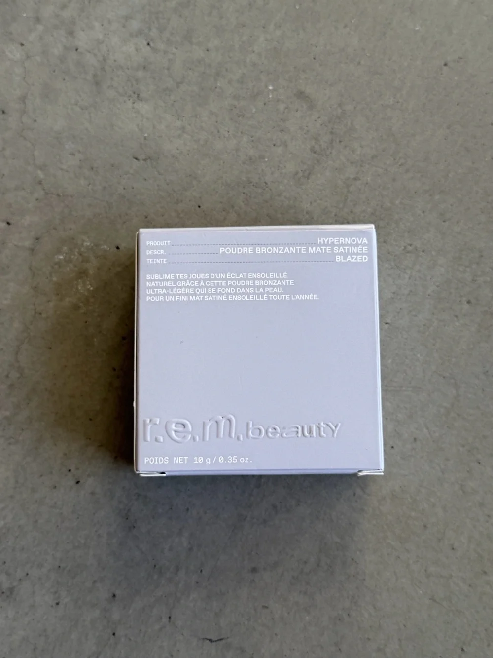 r.e.m. beauty / Hypernova Satin Matte Bronzer / Blazed